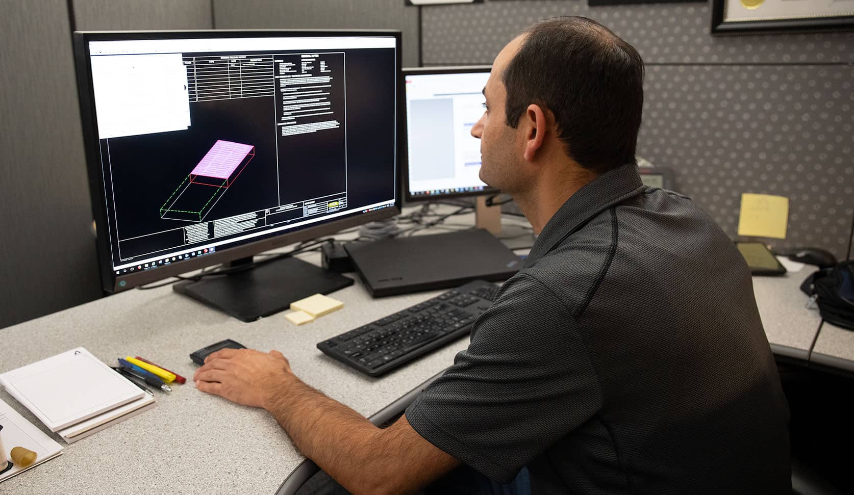 Male engineer working on a PC